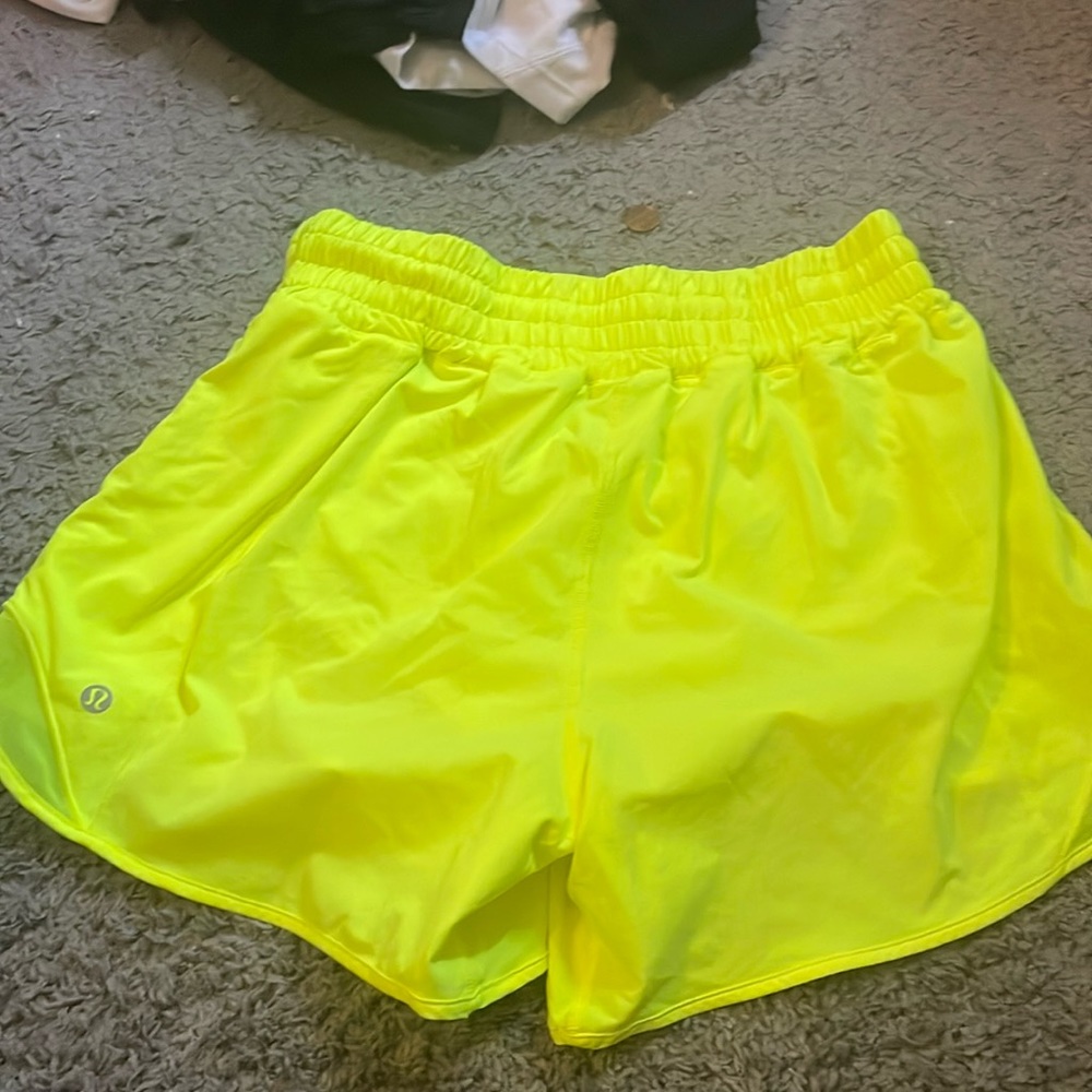 size 8 neon yellow lululemon shorts.       barely ever worn but tag is off